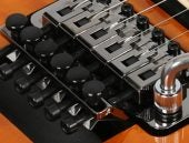 Hoe moet je een Floyd Rose tremolo stemmen?