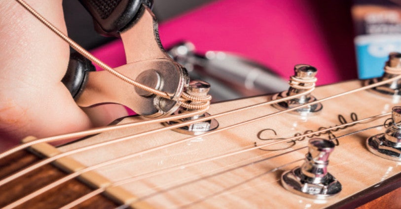 How to Change the Strings of Your Acoustic Guitar | Bax Music Blog
