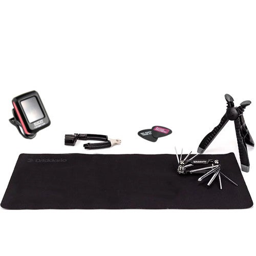 Which tools can come in handy during guitar maintenance?